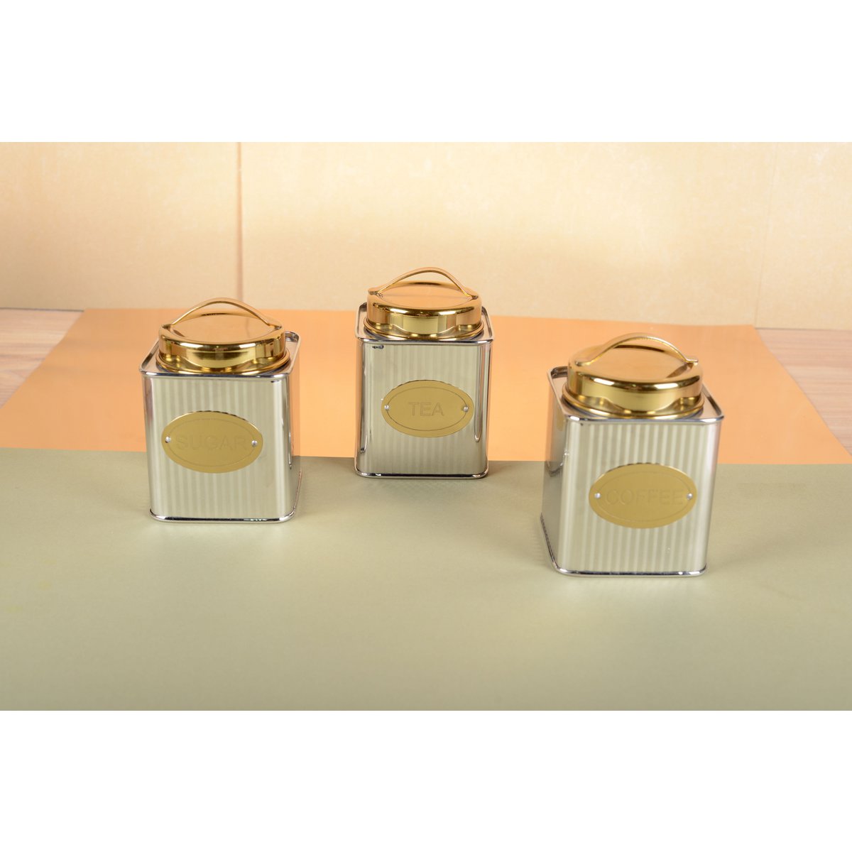 BOITE A CAFE ARGENTEE ET DOREE 10X10X10CM
