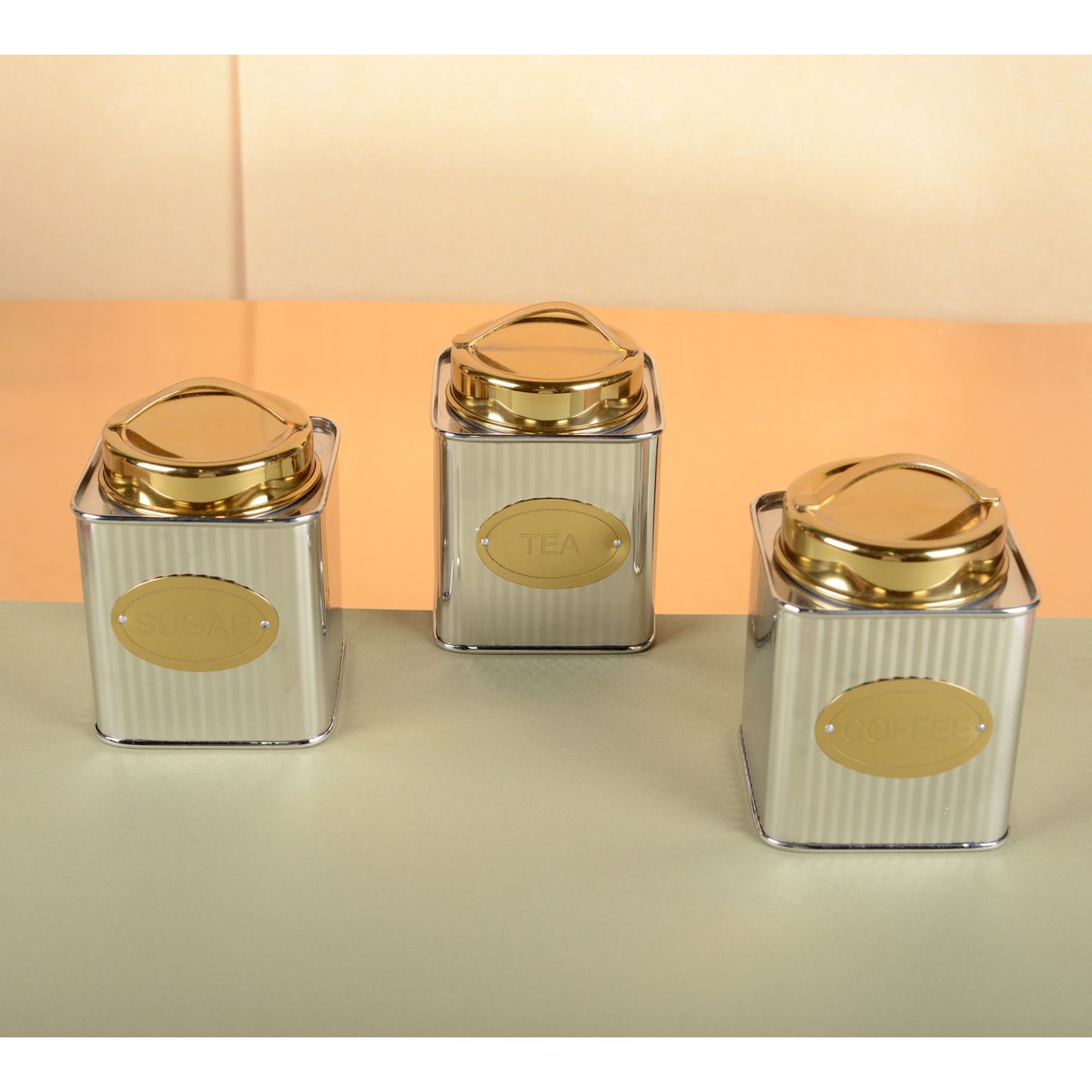 BOITE A THE ARGENTEE ET DOREE 10X10X10CM